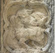 Panel 19:01 - Centaur-like creature (badly eroded)